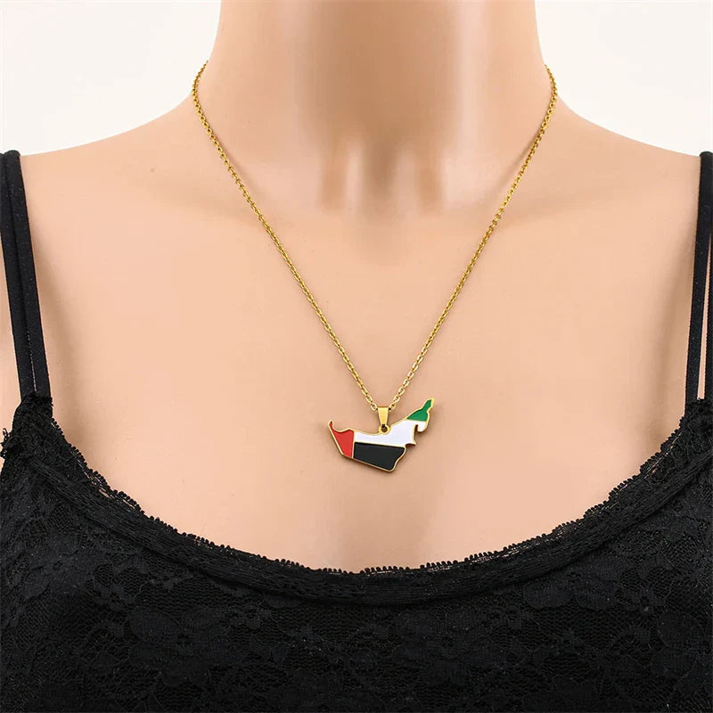 Gold and silver-plated UAE map flag pendant necklace on model, featuring stainless steel chain; suitable for women and men, party jewelry.