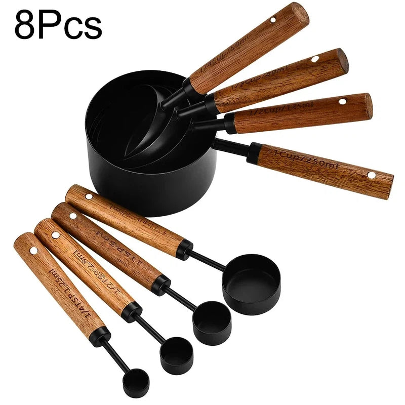 8-piece measuring cups set with stainless steel spoons and wooden handles, black bartending scale accessories.