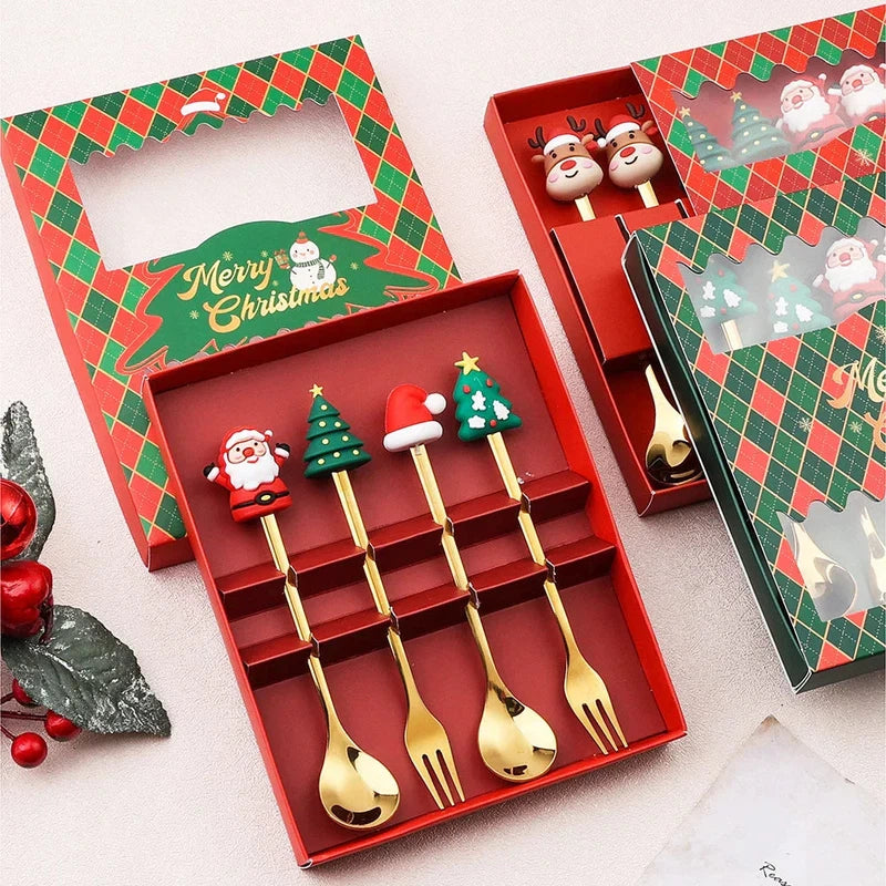 Christmas-themed stainless steel spoon and fork set in festive red and green gift boxes.