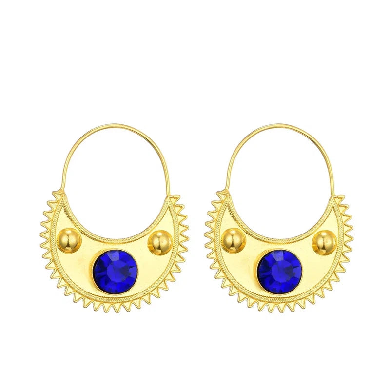 Gold Ethiopian zircon clip earrings for women with blue stones.