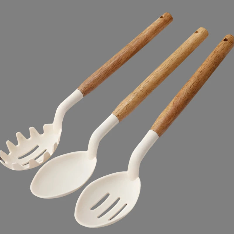 11-piece silicone cooking utensils set with wooden handles, eco-friendly non-stick kitchen tools.