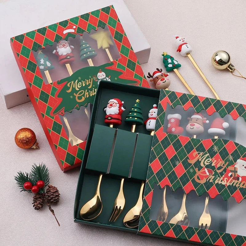 Christmas-themed stainless steel coffee spoons and forks set with festive decorations in a red and green gift box.