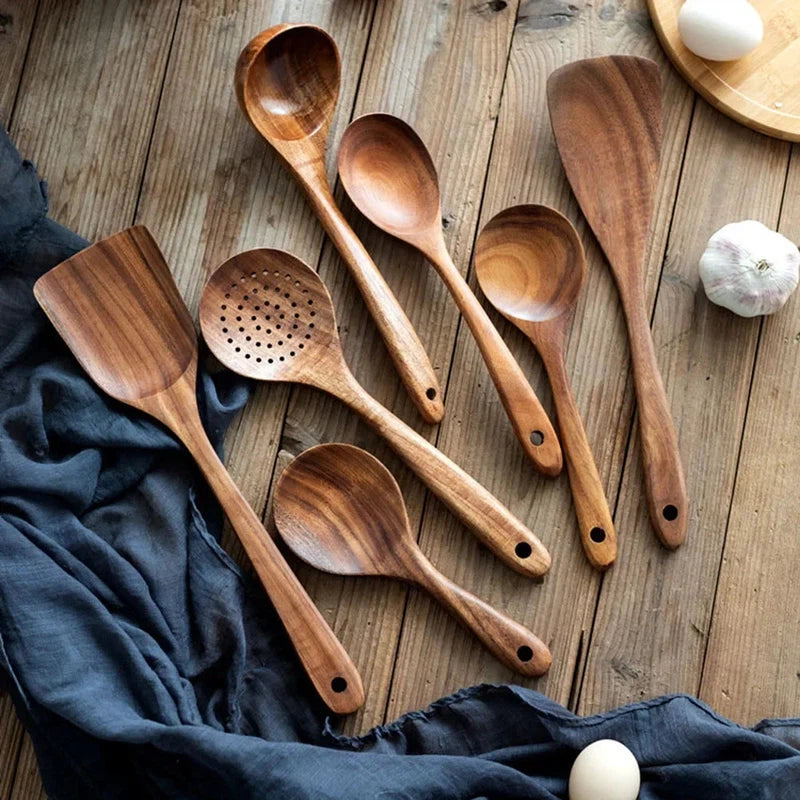 Wooden kitchen utensil set featuring non-stick soup spoon, spatula, and rice spoon.