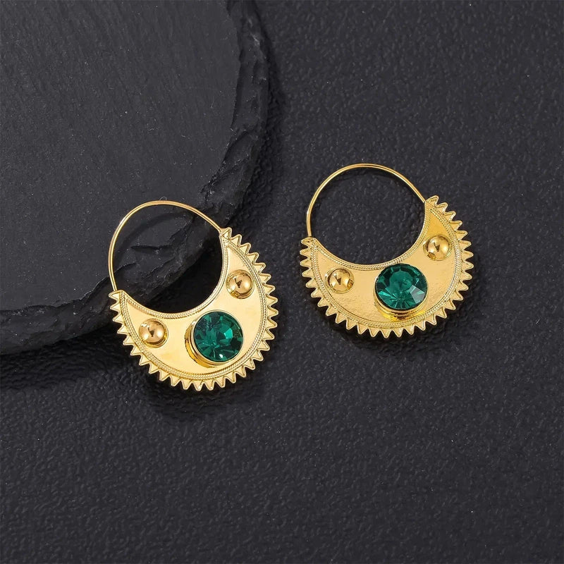 Gold Color Ethiopian Zircon Clip Earrings for Women and Girls on black background.