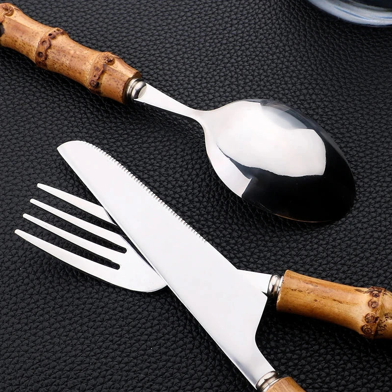 6//24Pcs dinnerware set with bamboo handle and stainless steel, featuring knife, fork, and spoon on luxury cutlery rack.