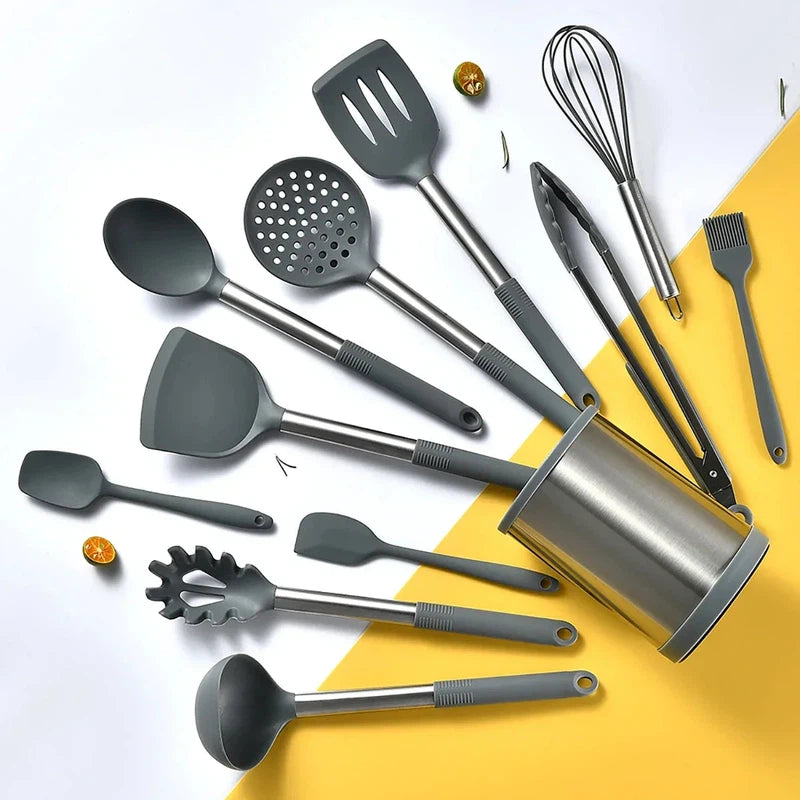 12-piece silicone kitchen utensil set with stainless steel handles and rotating storage bucket.